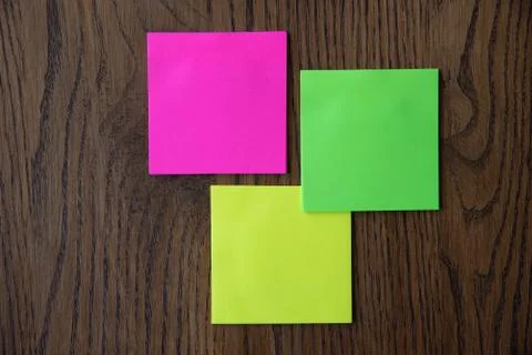 Colorful sticky notes on wooden background image. Stock Photos