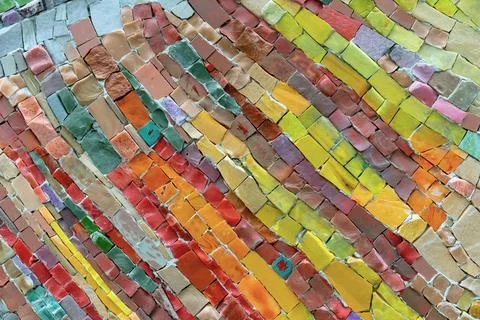 Colorful stone mosaic with chaotic pattern, seamless. Marble-stone mosaic. Stock Photos