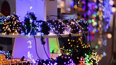 Colorful string lights glow brightly in a festive setting.  Stock Footage 322543856