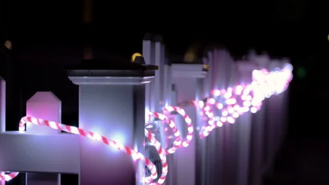 Colorful string lights at night. Close up of glowing outdoor decorative lights. Stock Footage 330985113