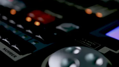 Colorful Studio Console with Red Orange Illuminated Buttons Stock Footage 340243231