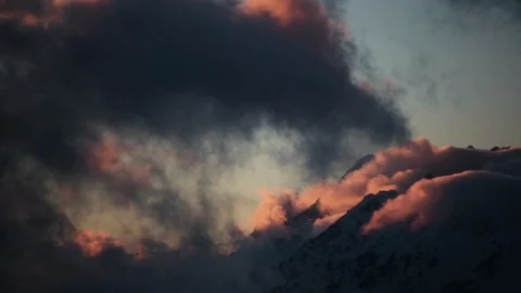 Colorful sunset Clouds over the Mountains. Rain clouds on the sunset 库存影片 87994609