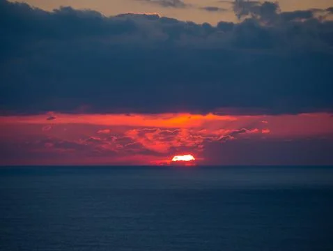 Colorful sunset with clouds Stock Photos
