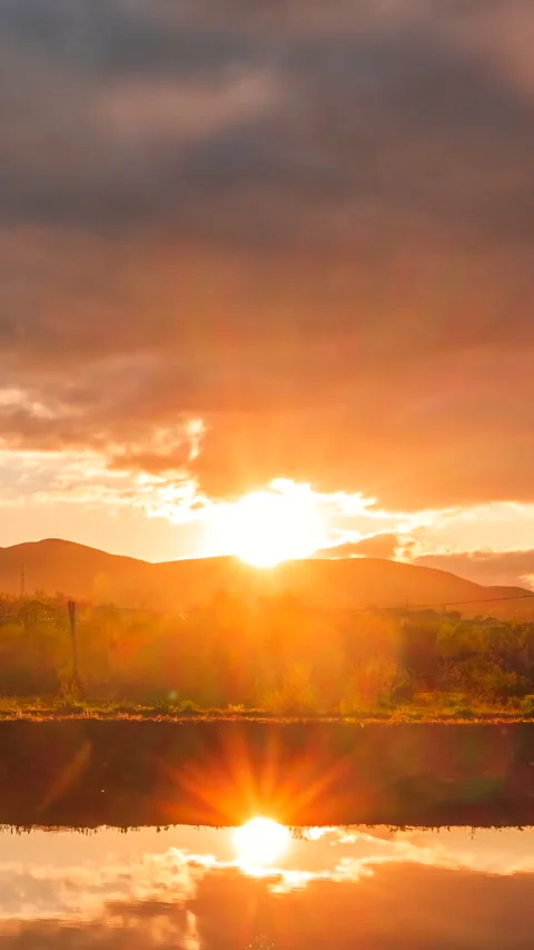 Colorful sunset in the cloudy sky Stock Footage 293157445