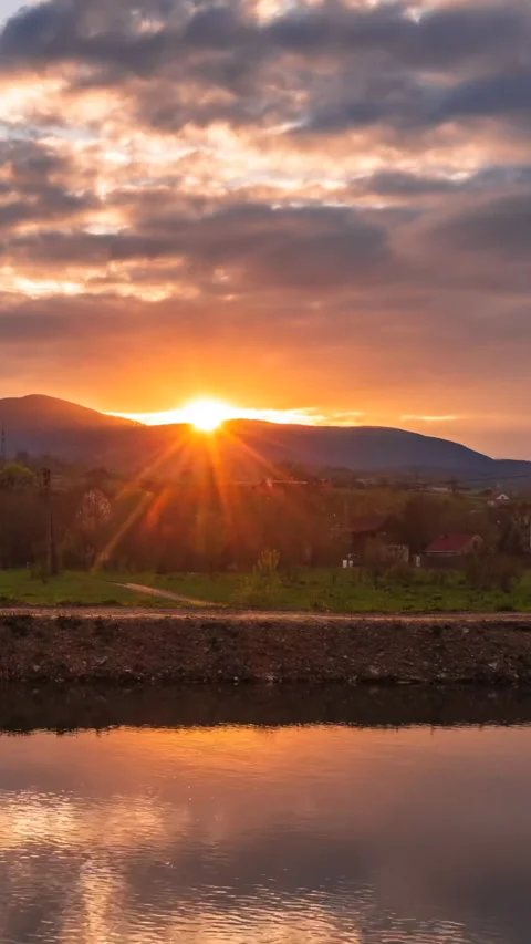 Colorful sunset in the cloudy sky Stock Footage 293157488