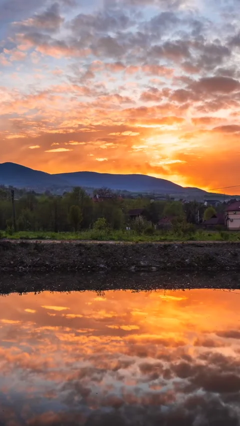 Colorful sunset in the cloudy sky time lapse Stock Footage 293157528