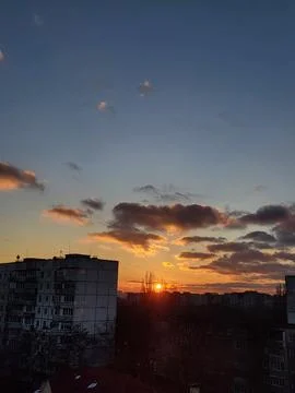 Colorful sunset with dramatic clouds Stock Photos