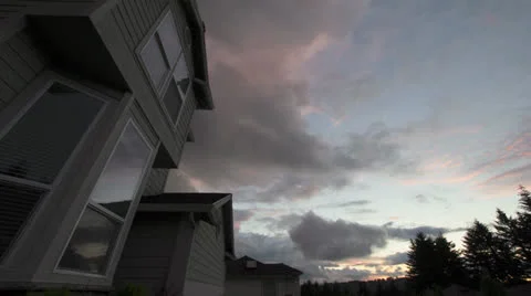 Colorful Sunset with Fast Moving Clouds at Dusk 1080p Stock Footage 24767709