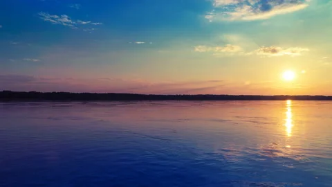 Colorful Sunset. Fflying over the River. Stock Footage