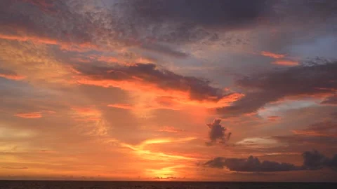 Colorful sunset at ocean side of Bali island in Indonesia. Stockbeeldmateriaal 266437075