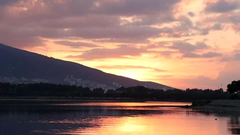 Colorful Sunset over a Lake Stock Footage 265584484
