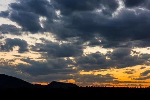 Colorful sunset over the mountain hills Stock Photos