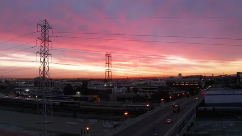Colorful sunset  over power lines and 7th Street Bridge Stock Footage 145103853
