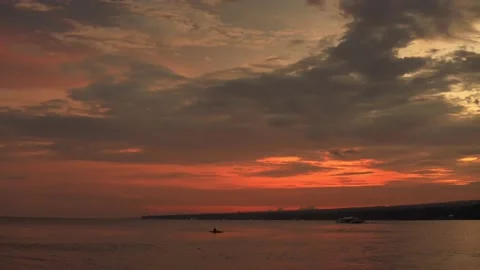 Colorful sunset over the sea. Calm atmosphere and waves Stockbeeldmateriaal 155221953