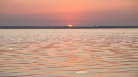 Colorful sunset reflection on sea surface Stock Footage 87619014