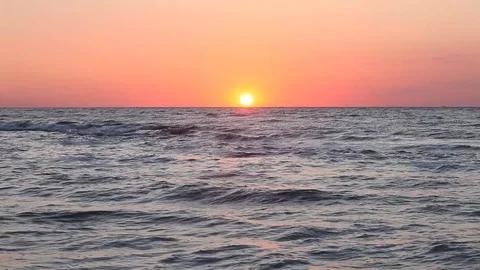 Colorful sunset reflection on sea surface Stock Footage 87632260