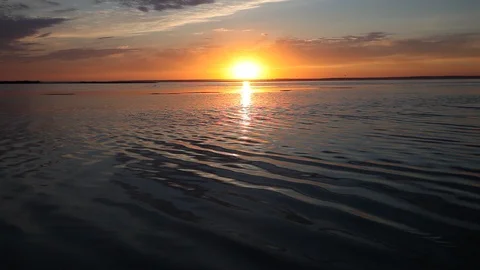 Colorful sunset reflection on sea surface Stock Footage 87632273