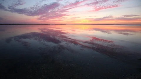 Colorful sunset reflection on sea surface Stock Footage 87632280