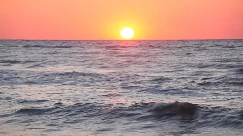 Colorful sunset reflection on sea surface Stock Footage 87632548