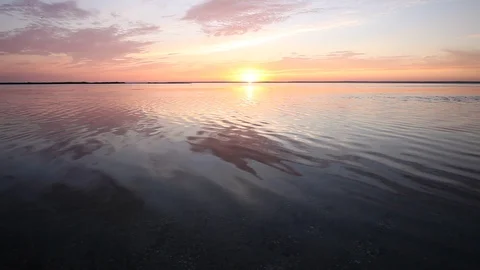Colorful sunset reflection on sea surface Stock Footage 87632577