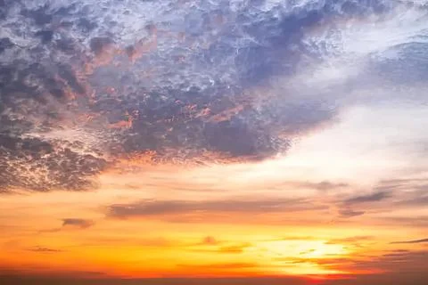 Colorful sunset sky with clouds over the horizon Stock Photos