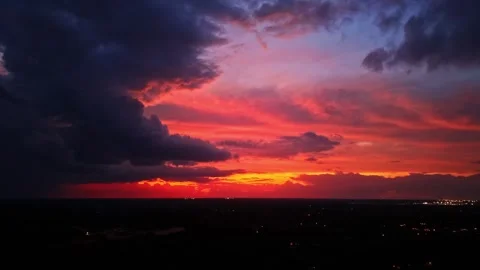 Colorful sunset sky with dramatic clouds over suburban landscape in Mississippi. Video stock 332082977