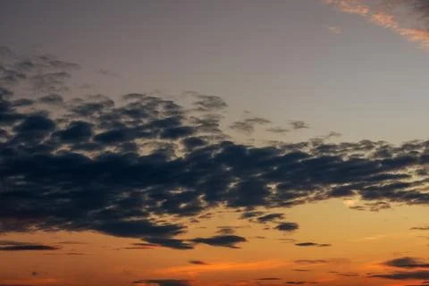 Colorful Sunset Sky with Dramatic Clouds Fotos Stock