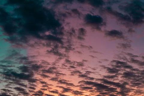 Colorful Sunset Sky With Dramatic Clouds Stock Photos