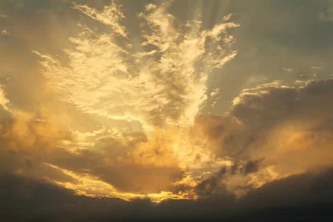 Colorful sunset sky with dramatic orange clouds. Only sky, no land. Stock Photos