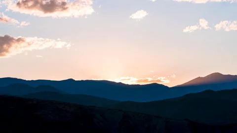 Colorful sunset timelapse sun rays flare in Aspen, Colorado rocky mountains Stock Footage 131584638