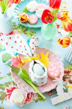 Colorful table setting for Easter Stock Photos