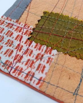 Colorful textile patchwork coaster Stock Photos