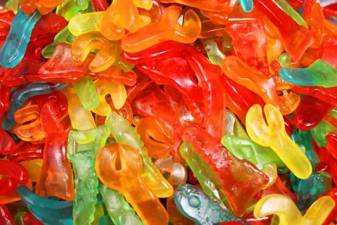 Colorful texture using as background. A lot of sweets. Background 3d rendering Stock Photos