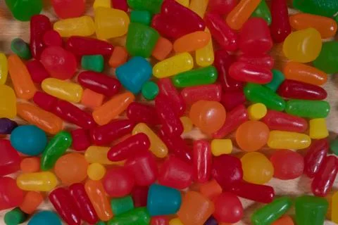 Colorful textured background of asserted candy pieces Stock Photos