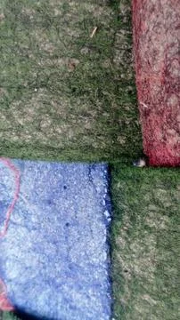 Colorful textured fabric patchwork background. Fotos de archivo