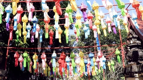 Colorful Thai lanterns blowing in the wind in Chiang Rai Northern Thailand 库存影片 100453712