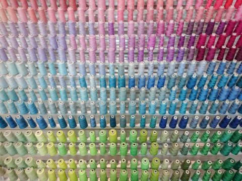 Colorful thread spool decoration Stock Photos