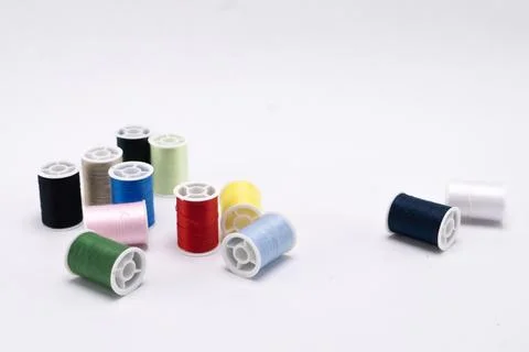 Colorful Thread Spools - Assorted Sewing Threads in Red, Blue, Green, Yello.. Stock Photos