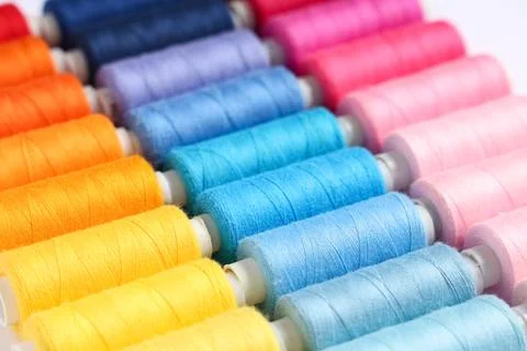 Colorful thread spools as background 写真素材