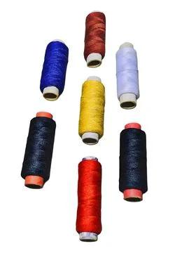 Colorful thread spools on white background 스톡 사진