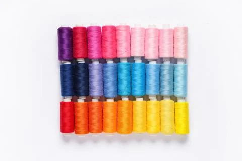 Colorful thread spools on white background 写真素材