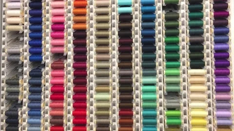 Colorful threads at a fabric store HD Stock Footage 135357580