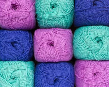 Colorful threads. Knitting background. Stock Photos