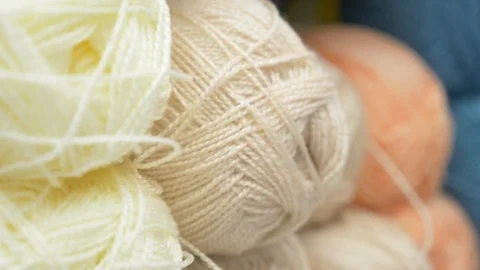 Colorful threads. Knitting pattern of colorful yarn wool on shopfront. Knitting Stock Footage 95422769
