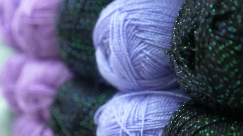 Colorful threads. Knitting pattern of colorful yarn wool on shopfront. Knitting Stock Footage 95422825