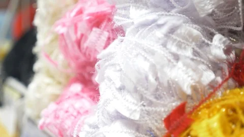 Colorful threads. Knitting pattern of colorful yarn wool on shopfront. Knitting Stock Footage 95422836