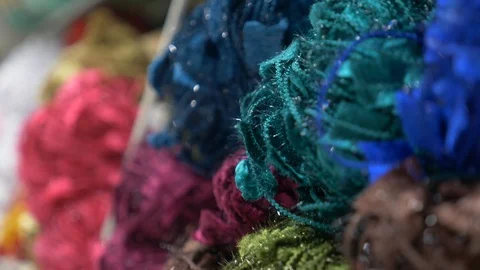 Colorful threads. Knitting pattern of colorful yarn wool on shopfront. Knitting Stock Footage 95422854