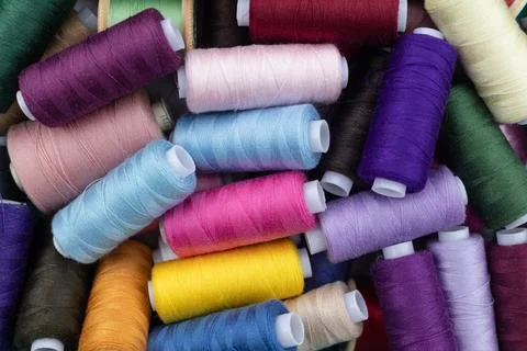 Colorful threads for sewing, multicolor spools of thread Stock Photos
