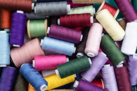Colorful threads for sewing, multicolor spools of thread Stock Photos