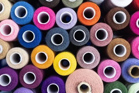 Colorful threads for sewing, multicolor spools of thread Stock Photos